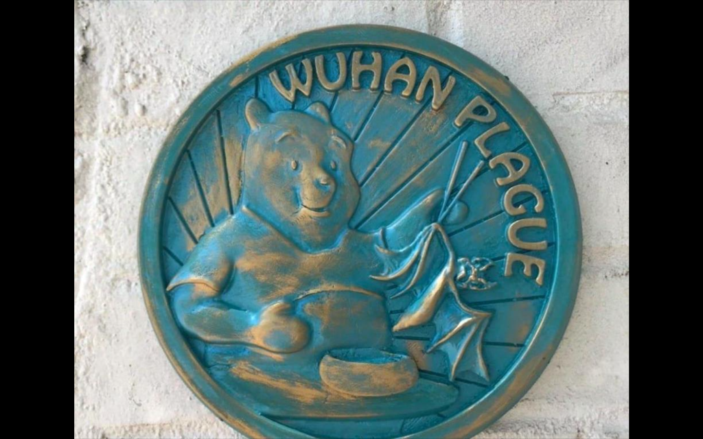 Racist plaques depicting Winnie the Pooh holding a bat with chopsticks have begun to pop up around Atlanta, and police have no leads as to who is responsible.