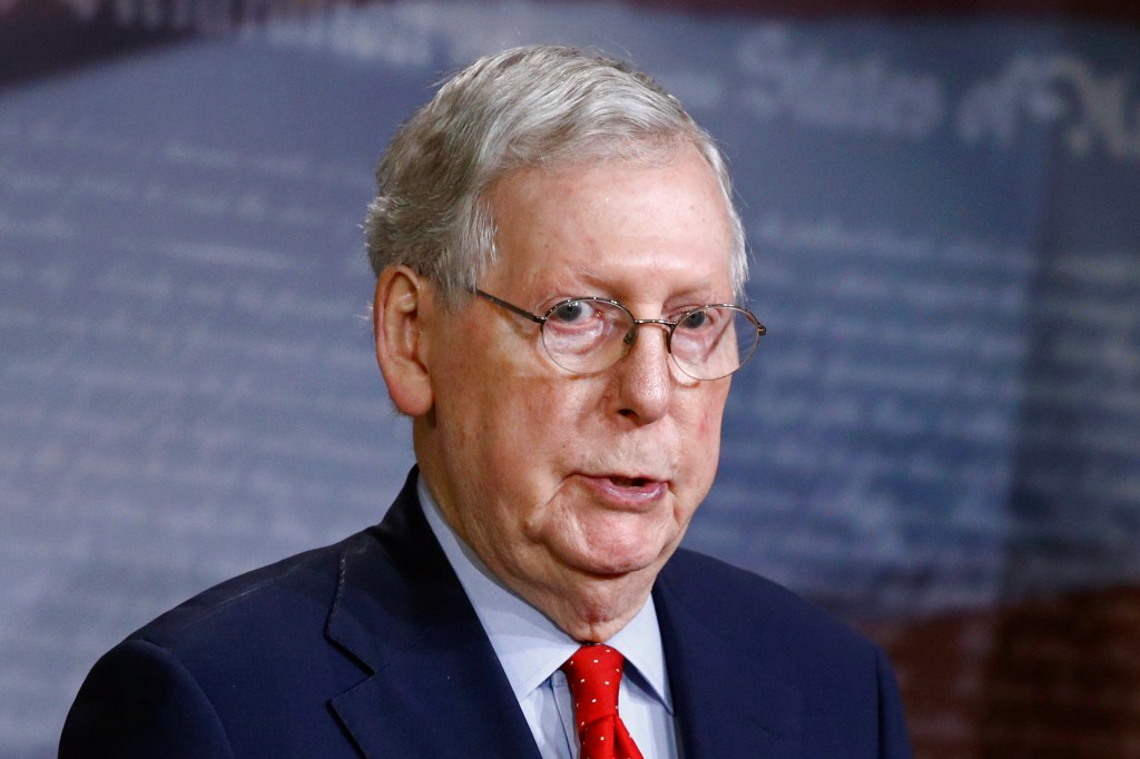 Senate Majority Leader Mitch McConnell of Ky., speaks with reporters after the Senate approved a nearly $500 billion coronavirus aid bill, Tuesday, April 21, 2020, on Capitol Hill in Washington. (AP Photo/Patrick Semansky)​