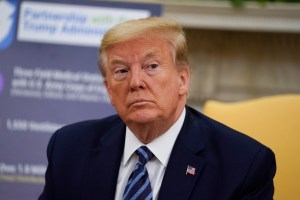 President Donald Trump listens during a meeting about the coronavirus response with Gov. Phil Murphy, D-N.J., in the Oval Office of the White House, Thursday, April 30, 2020, in Washington. (AP Photo/Evan Vucci)​