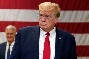 President Donald Trump participates in a tour of a Honeywell International plant that manufactures personal protective equipment, Tuesday, May 5, 2020, in Phoenix. (AP Photo/Evan Vucci)​