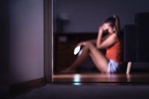 Stock image of a woman with a smartphone. Getty Images.