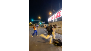 A group of young white men beat a non-white protester in Minneapolis as protests raged across the city, disturbing video obtained by VICE News shows.