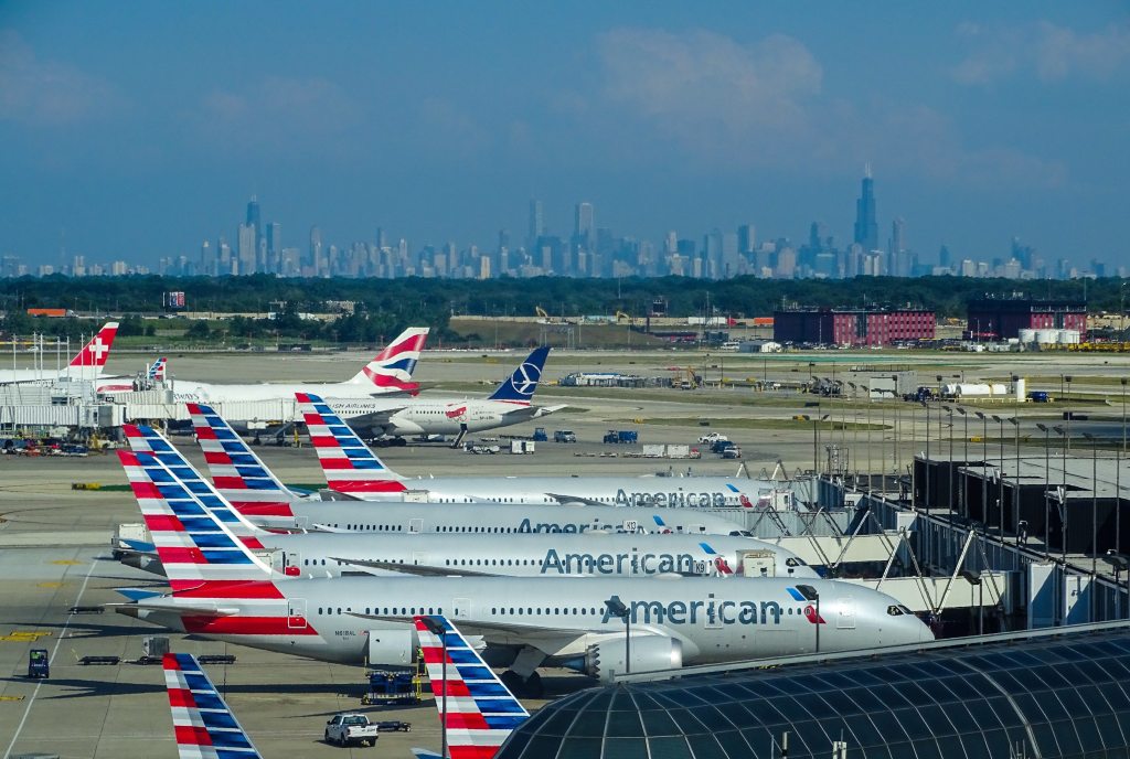 Planes on the ground at the Chicago O'Hare airport. How to get a flight refund and answers to your coronavirus travel related questions