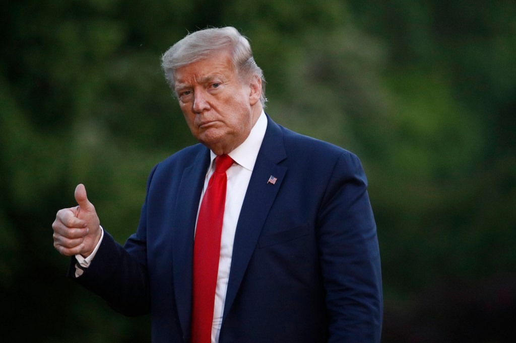 President Donald Trump gestures as he walks across the South Lawn of the White House in Washington, Saturday, May 30, 2020