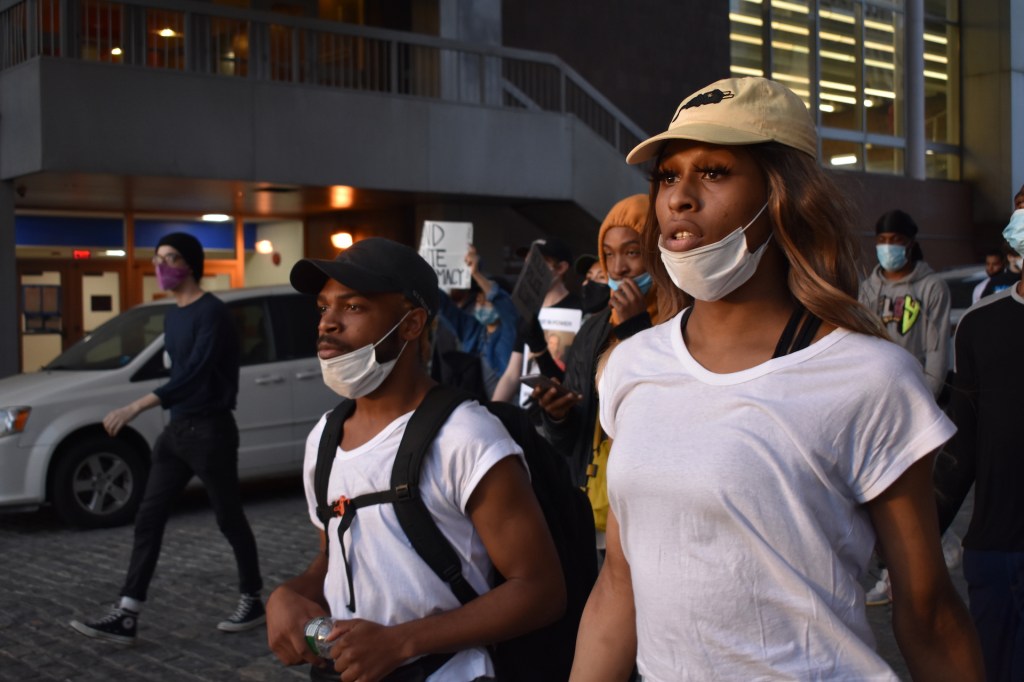 March organizers TS Candii, 26, and Tahtianna Fermin, 38, kneel in New York, New York on June 2 calling for justice for Tony McDade and Nina Pop, two black trans people killed in the last month.​ (Tomas Navia/VICE News)