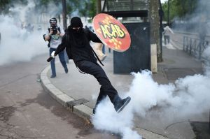 acab protester tear gas