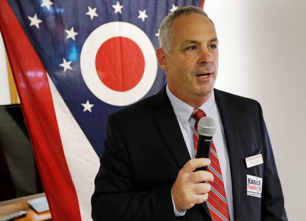 Steve Huffman, Republican candidate for the 80th district , speaks during a rally at Darke County GOP headquarters, Monday, Oct. 13, 2014, in Greenville, Ohio. (AP Photo/Al Behrman)​