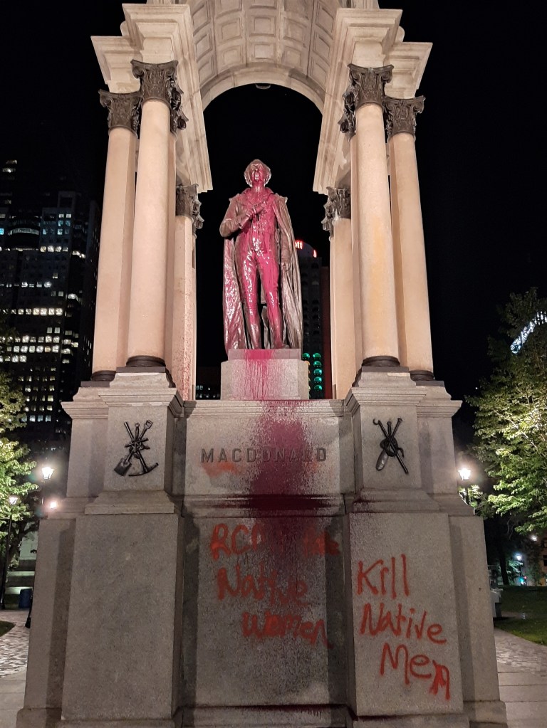 John A. Macdonald Monument in Montreal covered in paint.