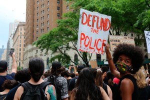 In this June 6, 2020, file photo, protesters march in New York. Since Floydâ€™s killing, police departments have banned chokeholds, Confederate monuments have fallen and officers have been arrested and charged. The moves come amid a massive, nationwide ou