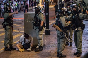 hk cops detain protester jul 1 2020 afp