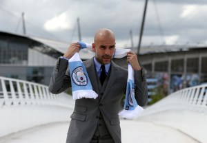 Pep Guardiola outside the Etihad.