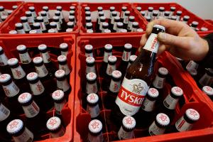 Tyskie beer crates in a supermarket​.