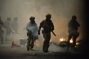 U.S. Federal Police use crowd control methods to disperse protesters at the Multnomah County Justice Center in Portland, Oregon, on July 23, 2020.