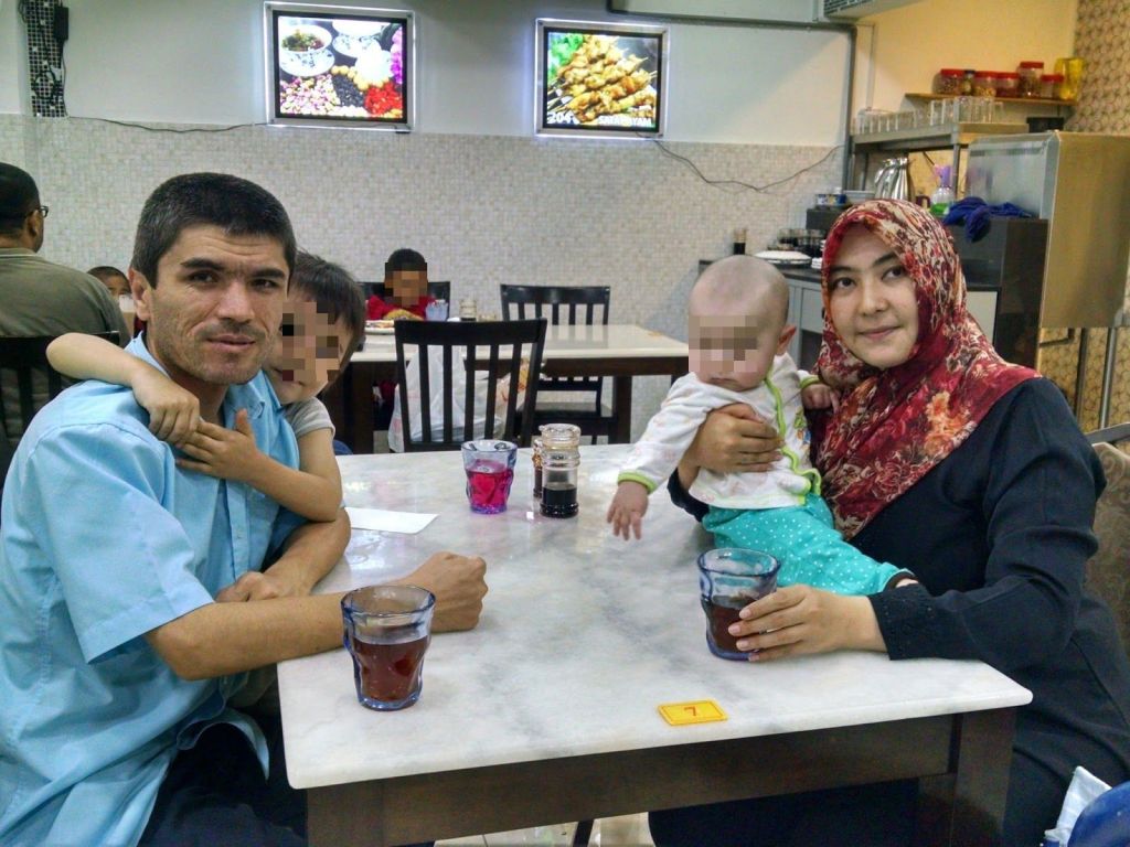 The Abdurehim family at a restaurant in Kuala Lumpur, Malaysia, in 2015. This would be their last photo taken together before the family was sent back​ to Xinjiang.