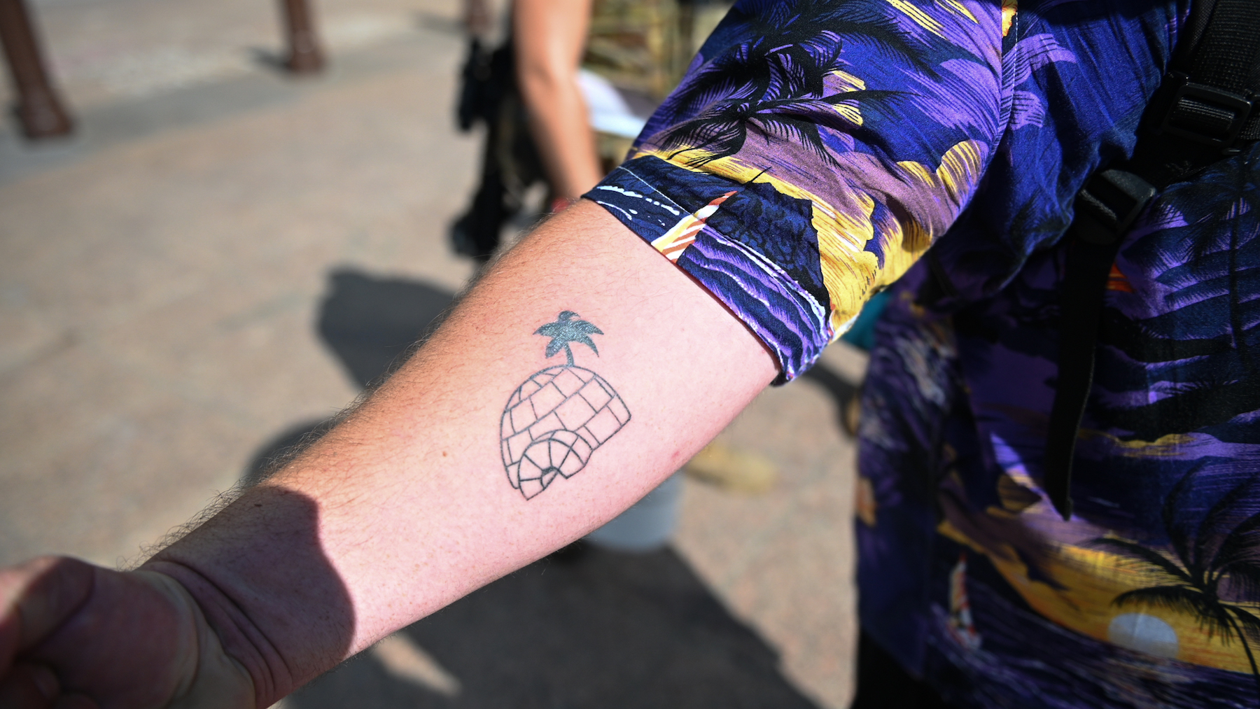 A Boogaloo Boi” shows his “big igloo” tattoo, which is slang for the “boogaloo,” at an anti-mask protest in Columbus, Ohio on July 18. (Photo by Zach D Roberts/NurPhoto via Getty Images)