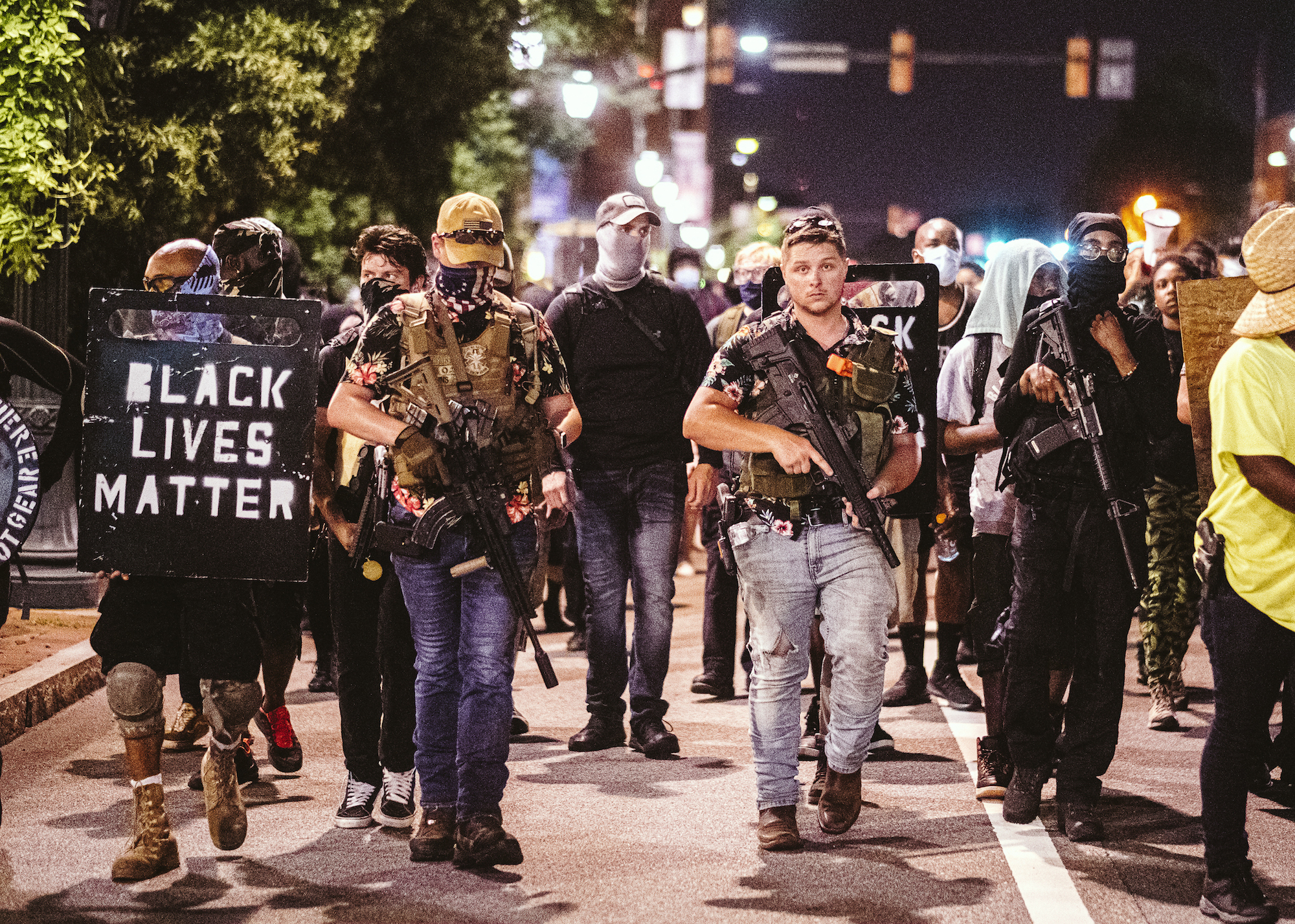 Mike Dunn and other Boogaloo Bois march with anti-racism protesters at a Stand With Portland rally on July 25 in Richmond, Virginia. (Photo by Eze Amos/Getty Images)