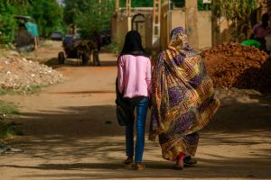 Sudanese women walk in the capital Khartoum's district.