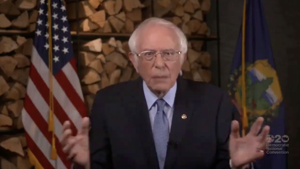 Vermont Sen. Bernie Sanders addresses the Democratic National Convention in front of some impressively-stacked firewood.