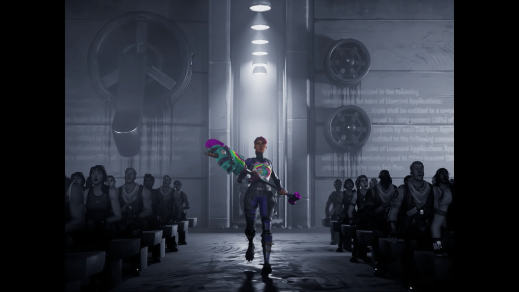 Screenshot from "Nineteen Eighty-Fortnite," the Bright Bomber skin from Fortnite, characterized by it's bright colors and rainbow shirt, is holding a unicorn pickaxe, standing in a gray drab industrial building flanked by gray avatars sitting in rows, sta