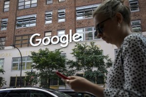 woman on phone outside google building