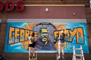 Artists complete a mural of George Floyd outside of Cup Foods, Thursday, May 28, 2020 in Minneapolis/ Minnesotans took to the streets in a third day of protests following the death of George Floyd at the hand of Minneapolis police officers. (Mark Vancleav