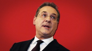 Heinz-Christian Strache im Anzug vor einem roten Hintergrund