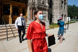 Salt Lake City Mayor Erin Mendenhal and Salt Lake City Police Chief Mike Brown arrive for a news conference Monday, Aug. 3, 2020, in Salt Lake City. Mendenhall signed an executive order Monday directing the police chief to enact several new policies, such