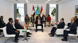 Ethiopian Prime Minister Abiy Ahmed, Egyptian President Abdel Fattah al-Sisi and Sudans President Omar Al Bashir take part in a tripartite summit