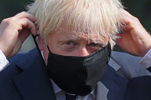 Boris Johnson wearing a face mask