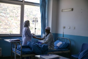 A nurse attends to a patient on the cancer ward at Jamhuriat Hospital in Kabul, Afghanistan