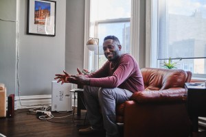 Hannibal Buress talking and wearing loafers