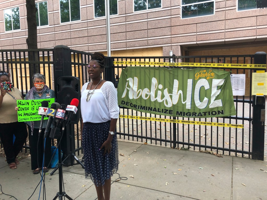 Dawn Wooten, a nurse at Irwin County Detention Center in Ocilla, Ga., speaks at a Tuesday, Sept. 15, 2020 news conference in Atlanta protesting conditions at the immigration jail. (AP Photo/Jeff Amy, File)