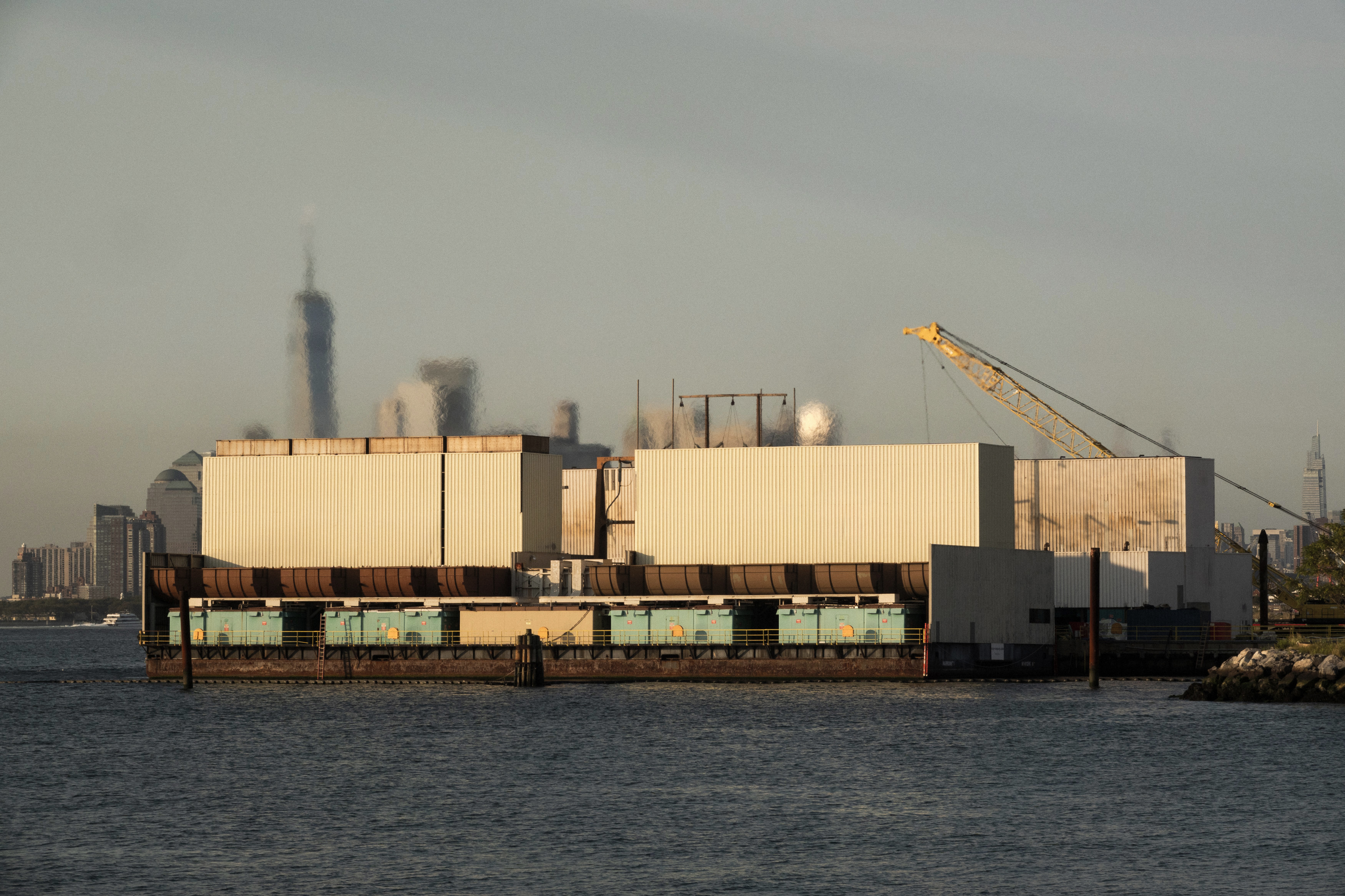 The Narrows Generating Station with the Manhattan skyline in the background