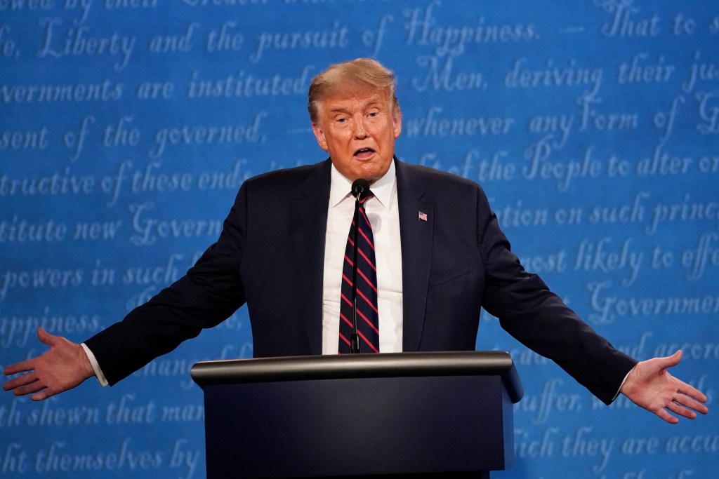 President Donald Trump gestures while speaking during the first presidential debate Tuesday, Sept. 29, 2020, at Case Western University and Cleveland Clinic, in Cleveland, Ohio. (AP Photo/Julio Cortez)