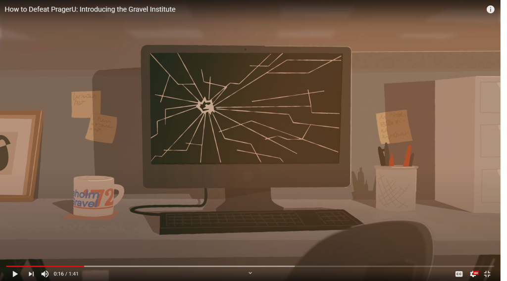 A screenshot from the Gravel Institute trailer depicting a smashed computer monitor.