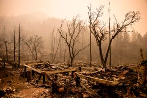 The remains of the guest houses at Calistoga Ranch smoulder after the Glass Fire passed through in, Calistoga, Napa Valley, California on September 30, 2020