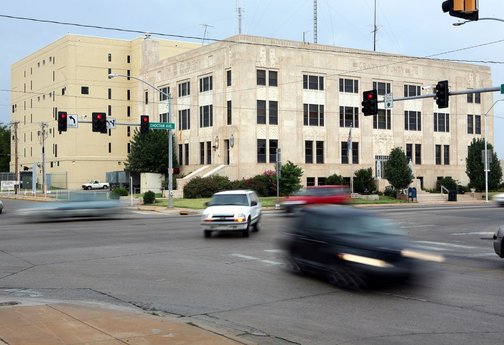 The new Grady County Jail building sits behind the old jail in Chickasha, Oklahoma, Friday, August 4, 2006.