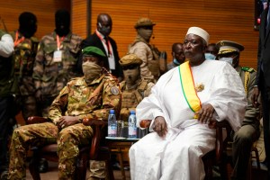 Transition Mali President Bah Ndaw (R) is seen with Interim Vice President Colonel Assimi Goita (L) during his inauguration ceremony in Bamako​.