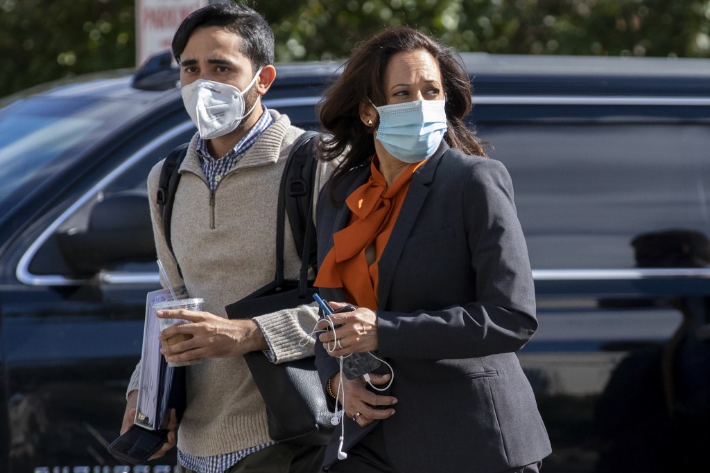 Senator Kamala Harris, Democratic vice presidential nominee, right, wears a protective mask while arriving to the Hart Senate Office building to participate in a Senate Judiciary Committee confirmation hearing in Washington, D.C., U.S., on Tuesday, Oct. 1