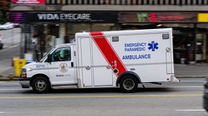 An ambulance speeds to an emergency call in Vancouver, B.C. on Thursday, October 8, 2020.