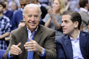 In this Jan. 30, 2010, file photo, Vice President Joe Biden, left, with his son Hunter, right (AP Photo/Nick Wass, File)​