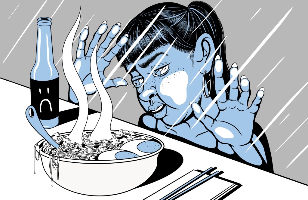 A woman looks longingly at a plate of ramen