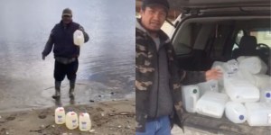 Members of Neskantaga First Nation collect gallons of lake water