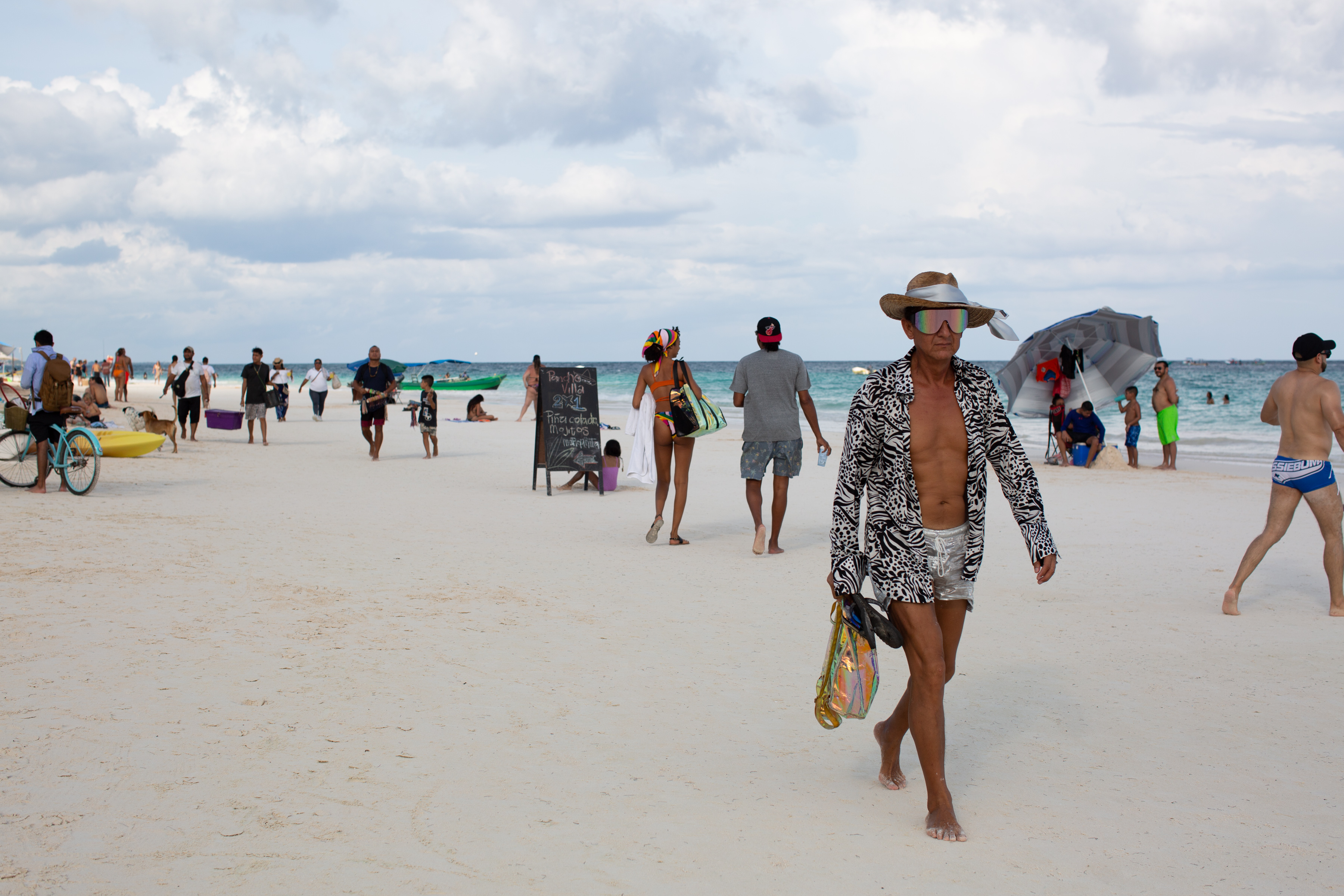 Locals and tourists on the beach