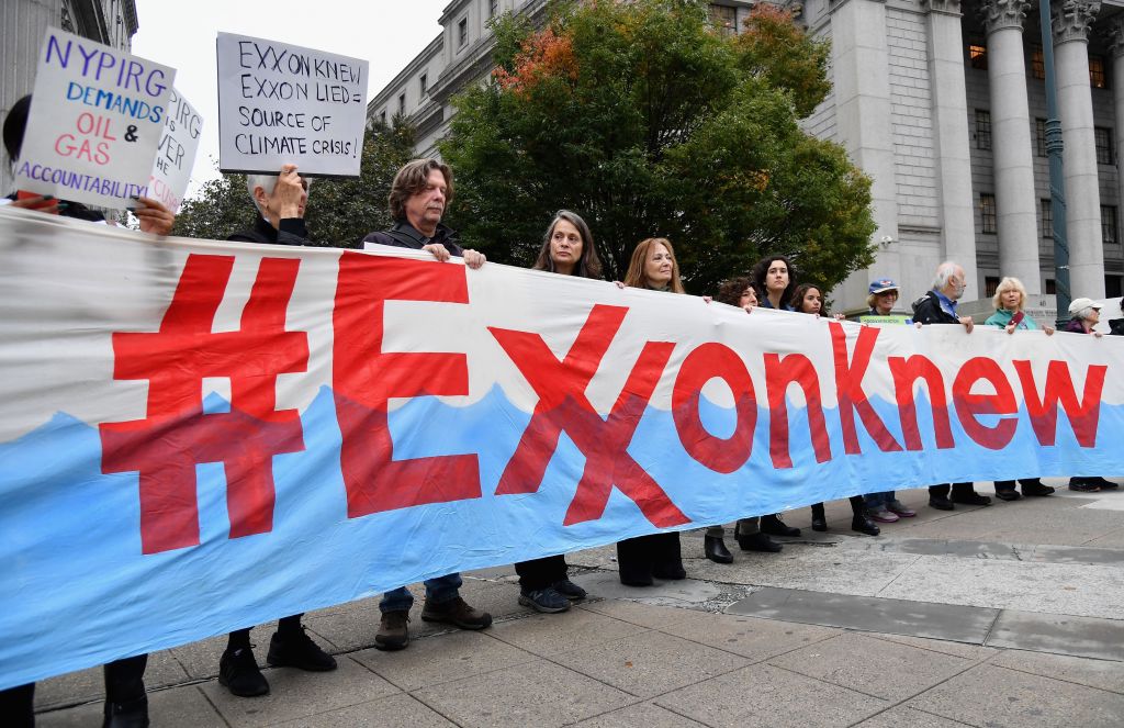 Climate activists protest Exxon outside the New York State Supreme Court on October 22, 2019.