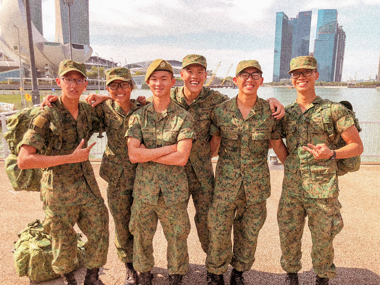 Female soldier Caitlin Ng (pictured second from left) with her male platoon mates