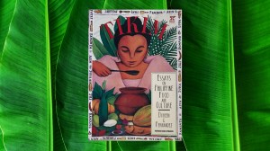 a photograph of doreen fernandez's 1994 book tikim in front of banana leaves