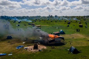 Shacks burn during a land eviction on October 29, 2020 in Guernica, Buenos Aires Province, Argentina.