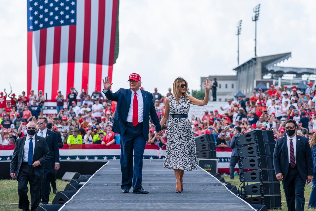 President Donald Trump and First Lady Melania Trump at a campaign rally outside Raymond James Stadium, Thursday, Oct. 29, 2020, in Tampa. (AP Photo/Evan Vucci)​