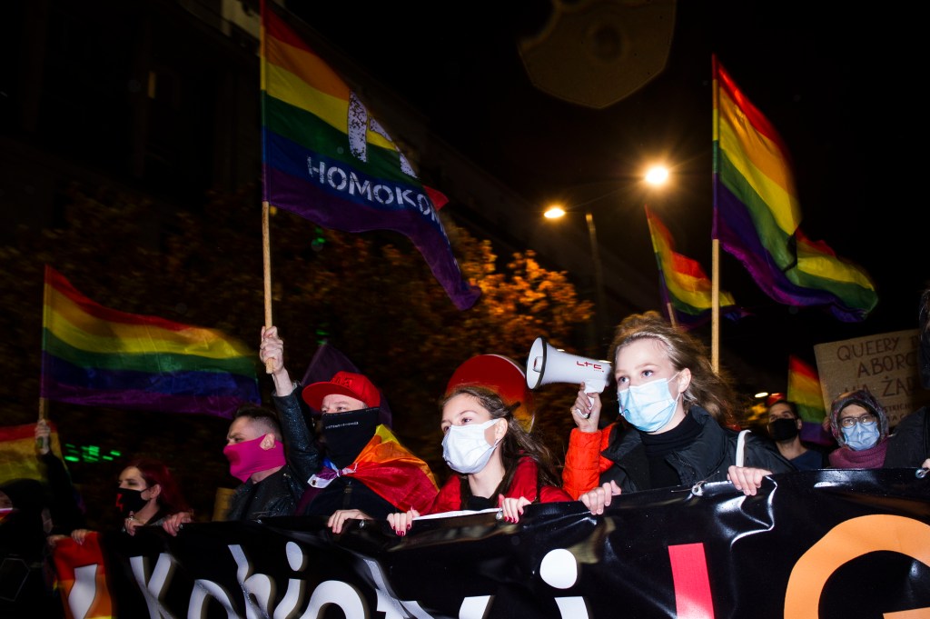 People take part in a demonstration against the abortion ban in Warsaw, Poland​.